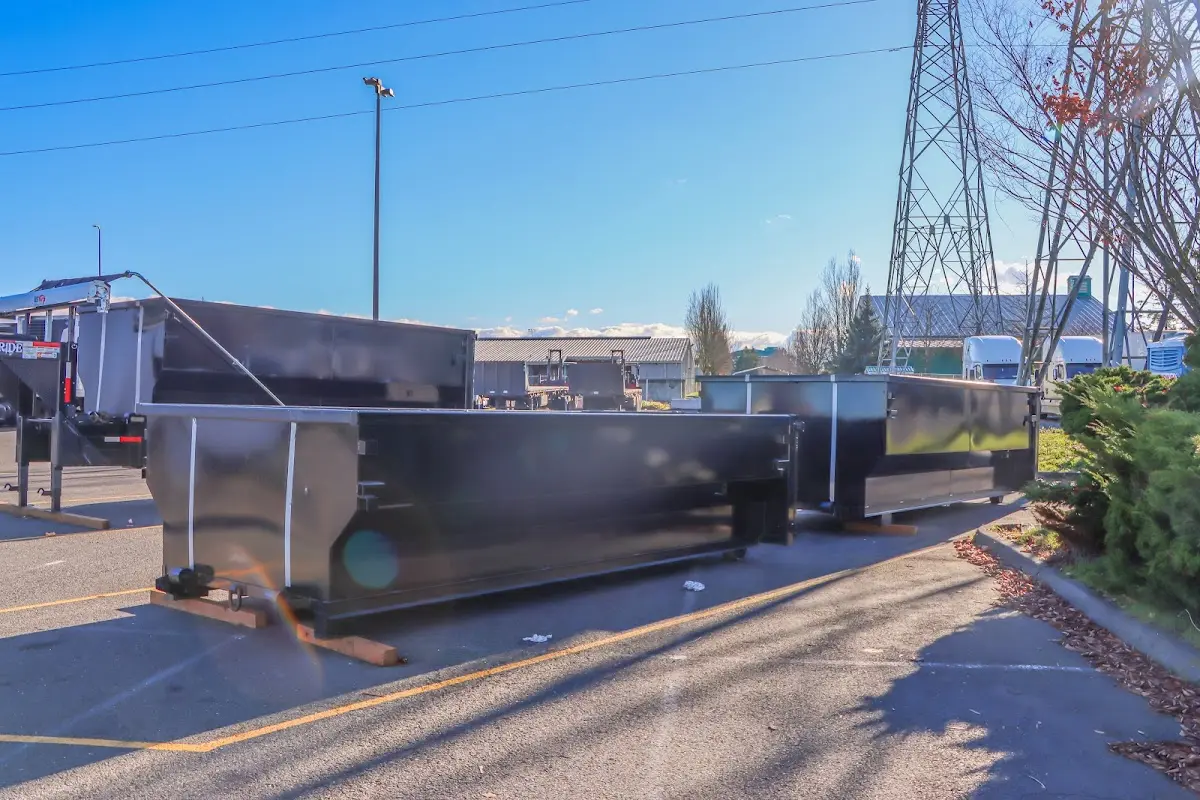Roll-off dumpster ready for waste disposal at job site for 15 Yard Dumpster Rental in Beaver Falls